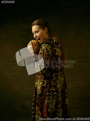 Image of Girl standing in Russian traditional costume.