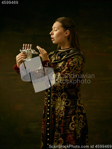 Image of Girl standing in Russian traditional costume.