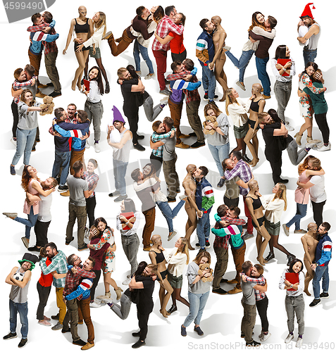 Image of Full body portrait of hugging people