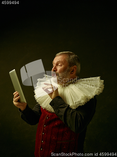 Image of Official portrait of historical governor from the golden age. Studio shot against dark wall.