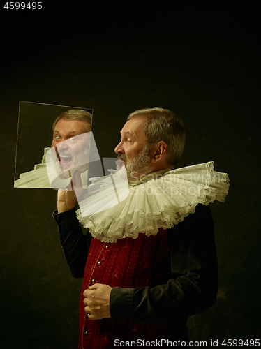 Image of Official portrait of historical governor from the golden age. Studio shot against dark wall.