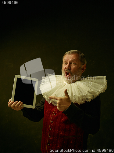 Image of Official portrait of historical governor from the golden age. Studio shot against dark wall.