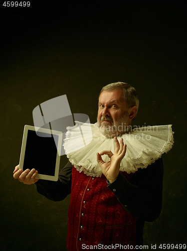 Image of Official portrait of historical governor from the golden age. Studio shot against dark wall.