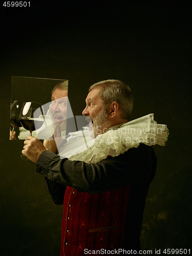 Image of Official portrait of historical governor from the golden age. Studio shot against dark wall.