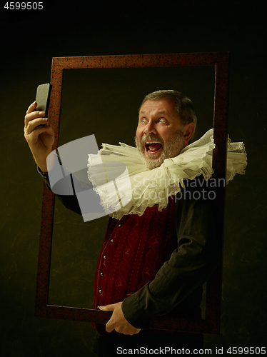 Image of Official portrait of historical governor from the golden age. Studio shot against dark wall.