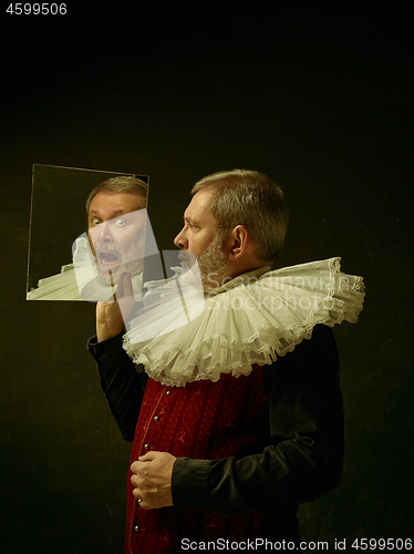 Image of Official portrait of historical governor from the golden age. Studio shot against dark wall.