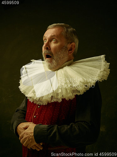 Image of Official portrait of historical governor from the golden age. Studio shot against dark wall.