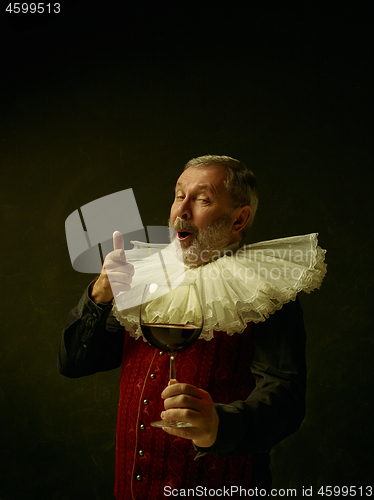 Image of Official portrait of historical governor from the golden age. Studio shot against dark wall.