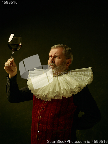 Image of Official portrait of historical governor from the golden age. Studio shot against dark wall.