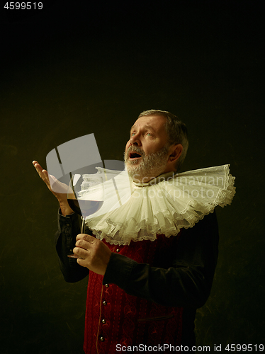 Image of Official portrait of historical governor from the golden age. Studio shot against dark wall.