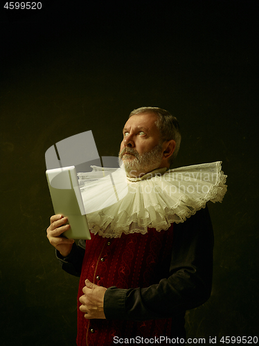 Image of Official portrait of historical governor from the golden age. Studio shot against dark wall.