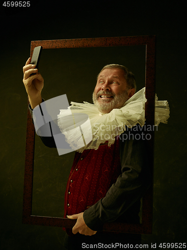 Image of Official portrait of historical governor from the golden age. Studio shot against dark wall.