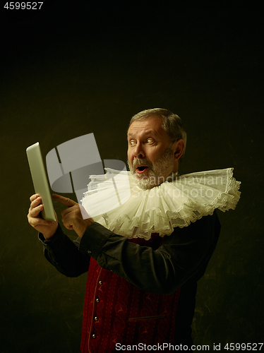 Image of Official portrait of historical governor from the golden age. Studio shot against dark wall.