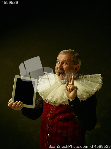 Image of Official portrait of historical governor from the golden age. Studio shot against dark wall.