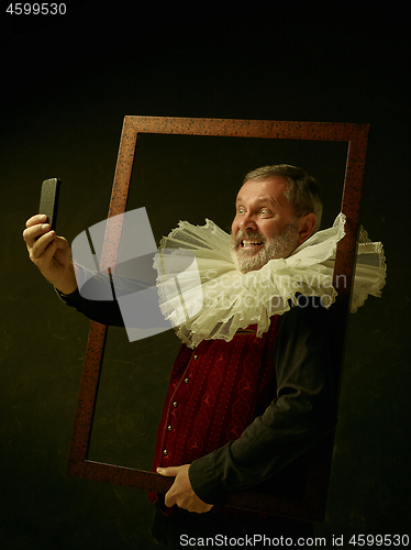 Image of Official portrait of historical governor from the golden age. Studio shot against dark wall.