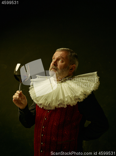 Image of Official portrait of historical governor from the golden age. Studio shot against dark wall.