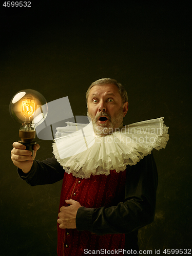 Image of Official portrait of historical governor from the golden age. Studio shot against dark wall.