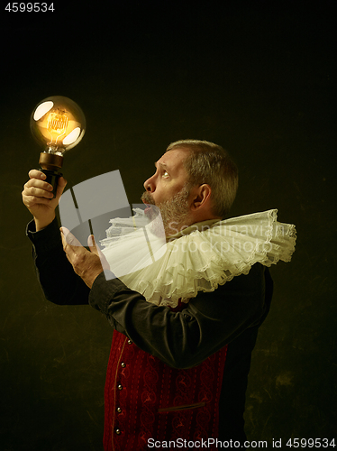 Image of Official portrait of historical governor from the golden age. Studio shot against dark wall.