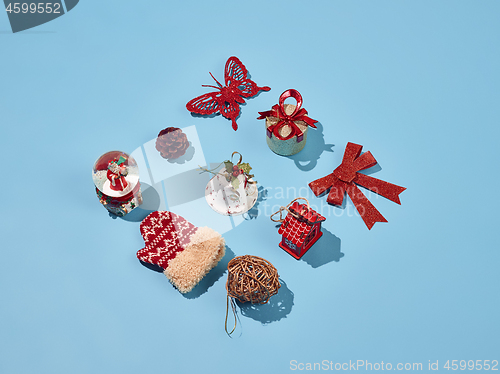 Image of Christmas decoration background over blue background, above view with copy space