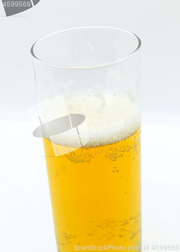 Image of Glass of beer on a light background