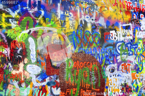 Image of Bright colorful John Lennon's wall with graffiti in Prague