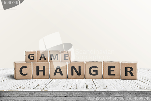Image of Game changer sign made of wooden blocks