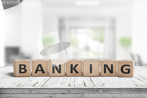 Image of Banking sign on a wooden desk