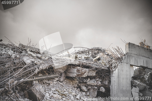 Image of Ruin in a war zone with a damaged concrete building 