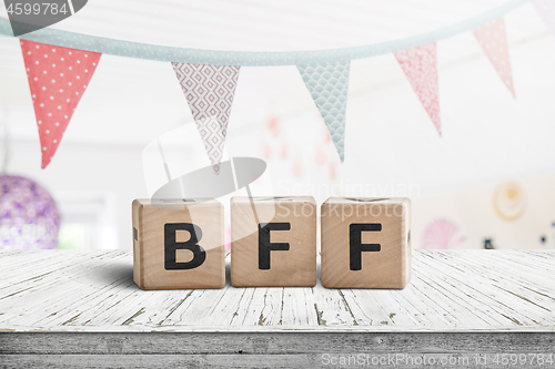 Image of BFF greeting message made of wooden blocks