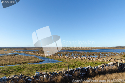 Image of Flooded landscape with traditional dry stone walls