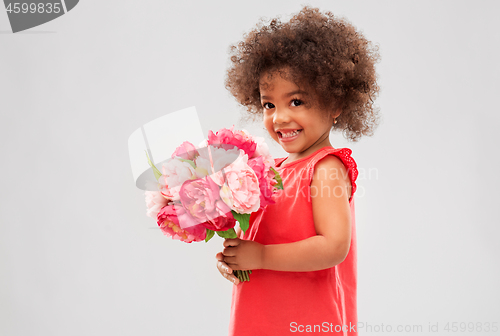 Image of happy little african american girl with flowers