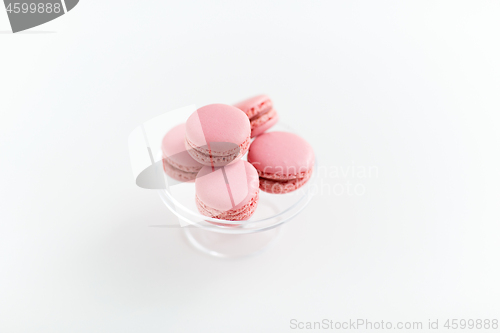 Image of pink macarons on glass confectionery stand