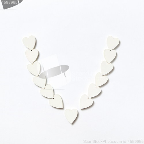 Image of Handmade necklace made from paper hearts with soft shadows.