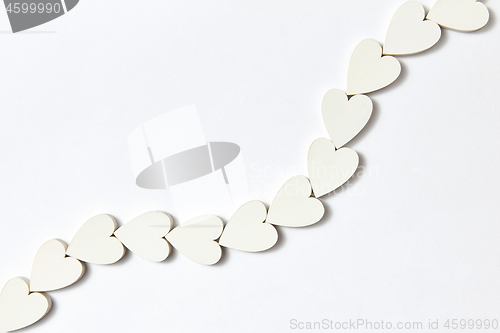 Image of Hearts decoration in the shape of chain with soft shadows.