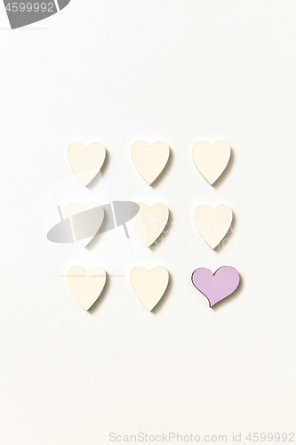 Image of Square from paper Valentine\'s hearts with soft shadows.