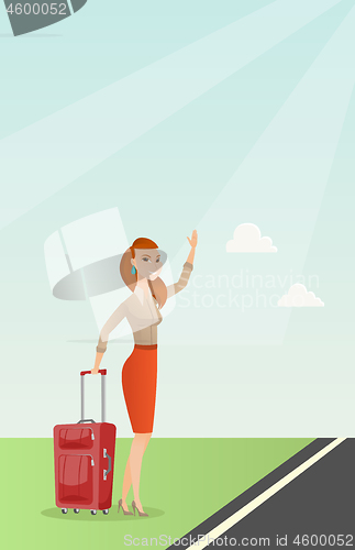 Image of Young caucasian woman with suitcase hitchhiking.