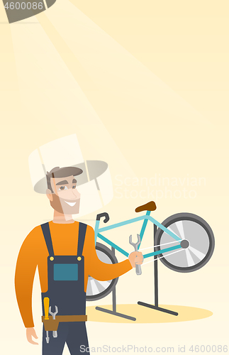 Image of Caucasian bicycle mechanic working in repair shop.