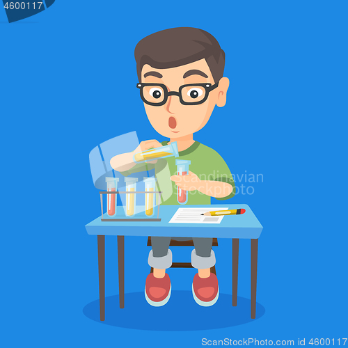 Image of Kid conducting experiment in laboratory class.