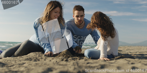 Image of Young family enjoying vecation during autumn