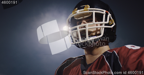 Image of portrait of young confident American football player