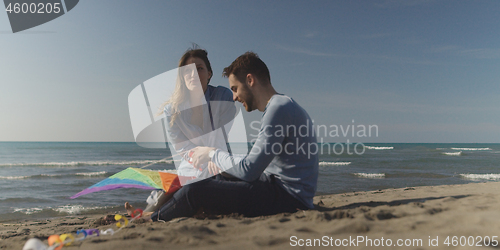 Image of Couple enjoying time together at beach