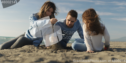 Image of Young family enjoying vecation during autumn