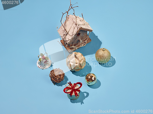 Image of Christmas decoration background over blue background, above view with copy space
