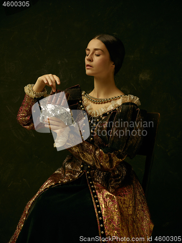 Image of Portrait of a girl wearing a retro princess or countess dress