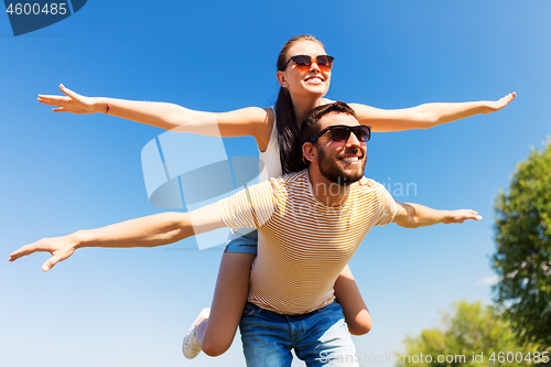 Image of happy couple having fun in summer