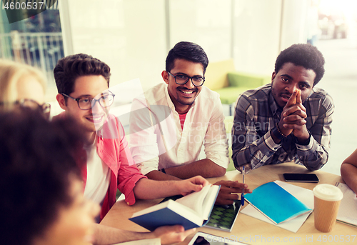 Image of group of high school students sitting at table