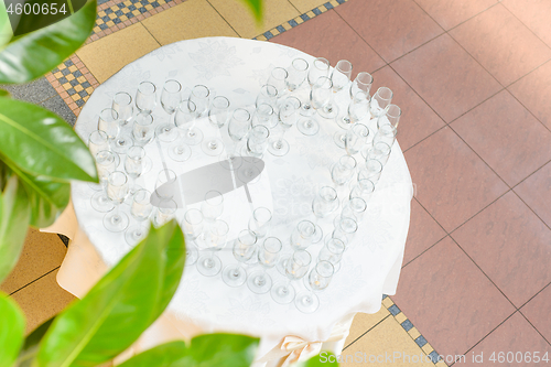 Image of Aerial view to the table with champagne glasses