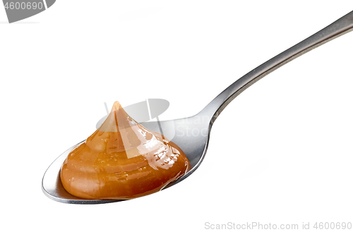 Image of spoon of caramel