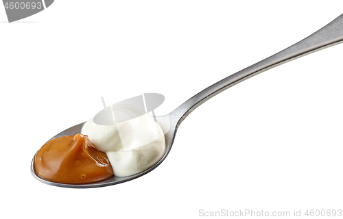 Image of spoon of yogurt and soft caramel