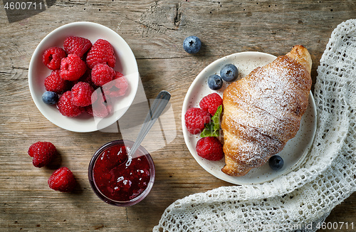 Image of sweet croissant and berries